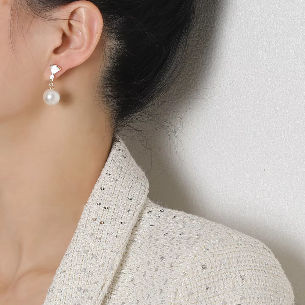 Boucles d’oreilles chic en argent avec perles