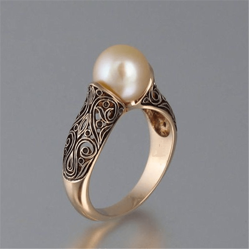 Bague en or filigrané avec perle