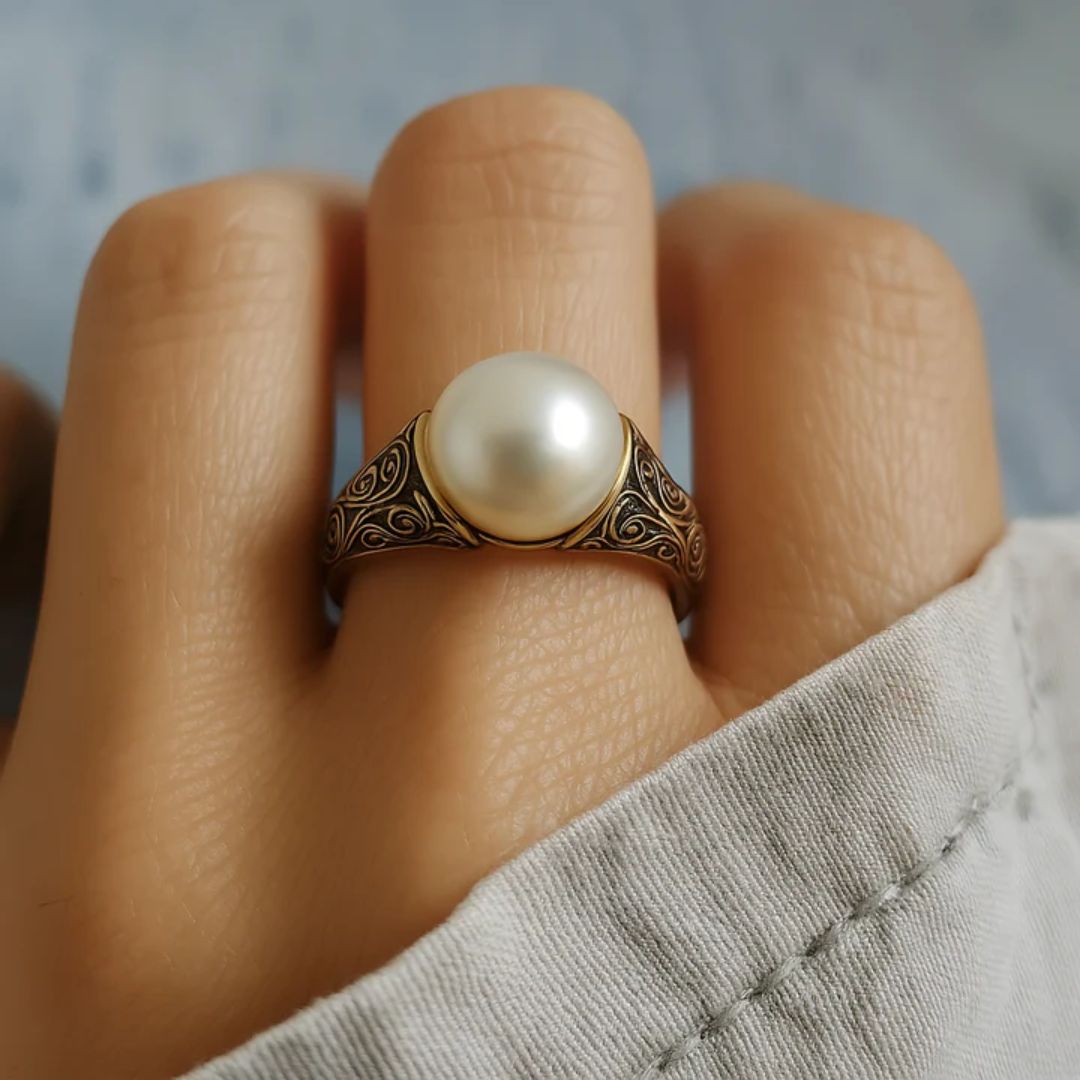 Bague en or filigrané avec perle
