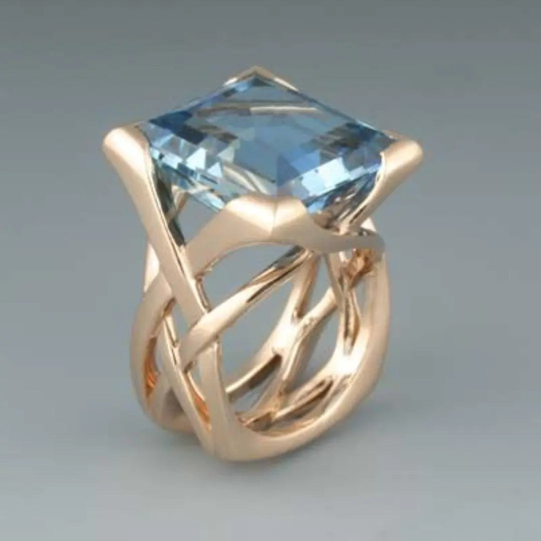 Antique-Inspired Rose Gold Ring with Blue Zirconia